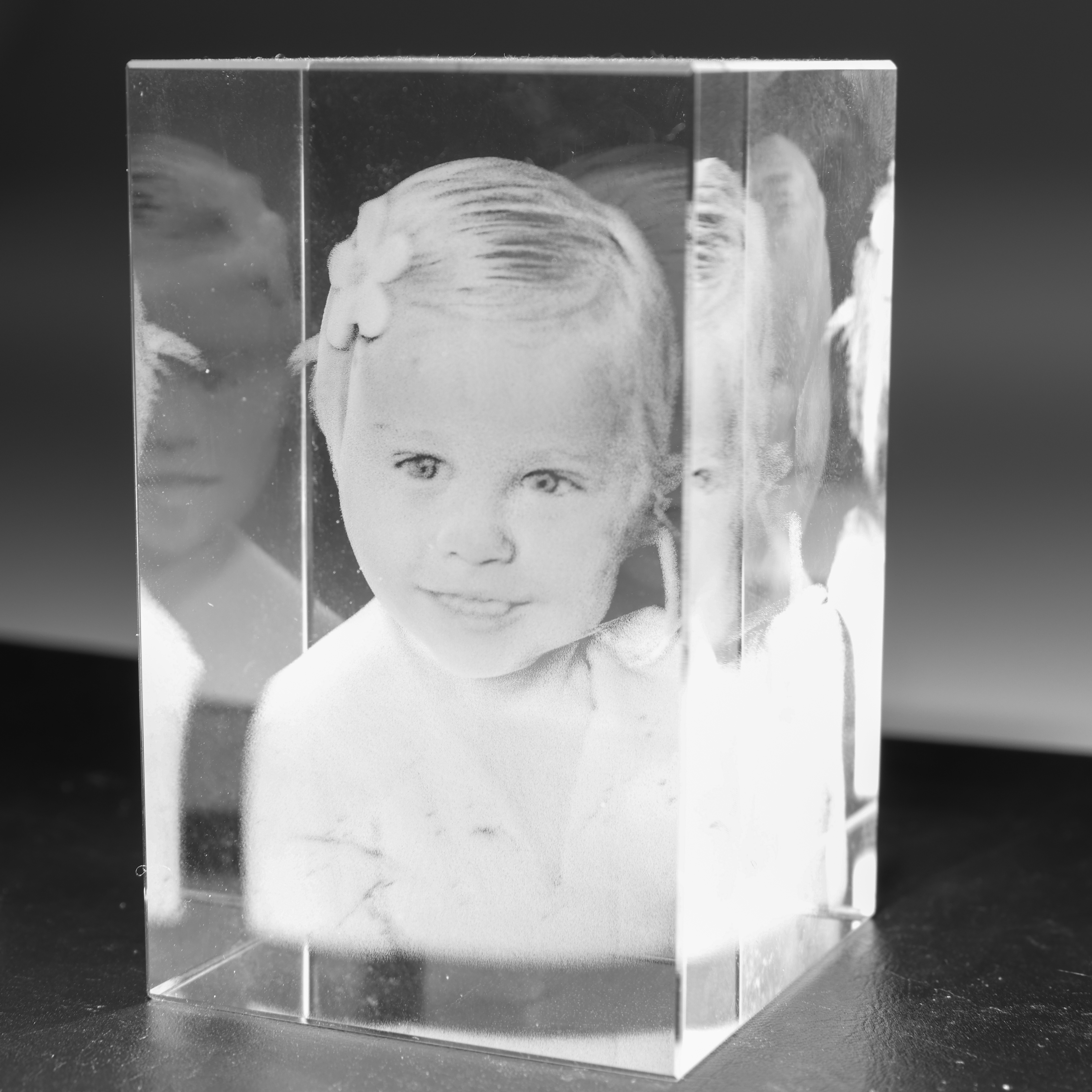 3D krystaller med billede af 3 hoveder